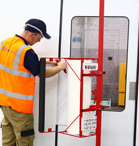 Man in a spray booth carrying out works - Performance and Safety for Spraybooths: Housekeeping