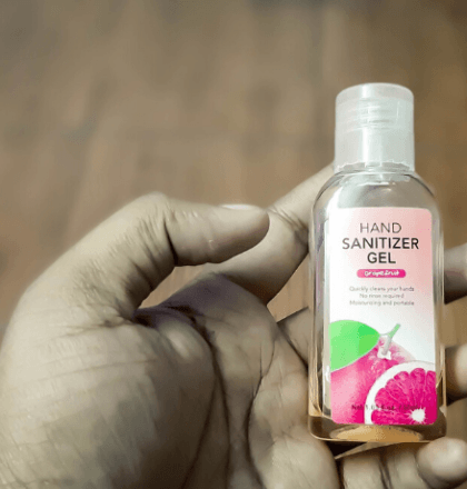 Person holding hand sanitiser - Is Leaving Hand Sanitiser in Your Car Dangerous?